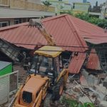 bulldozer on tomar brothers office
