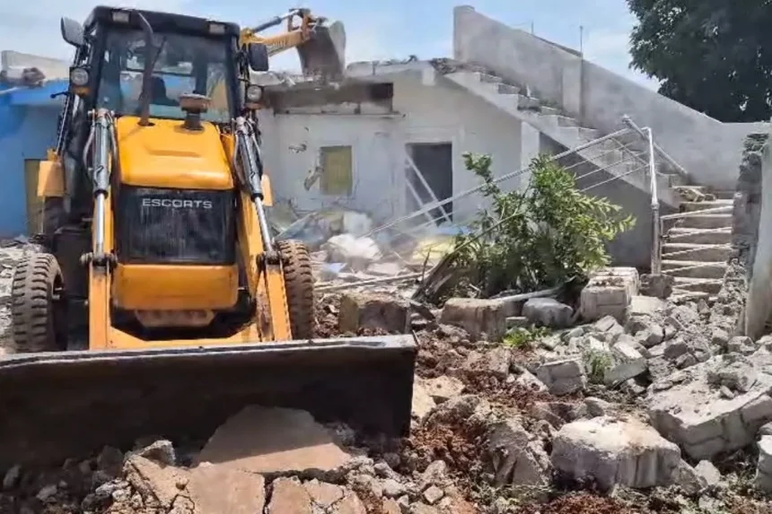 Bulldozer on church